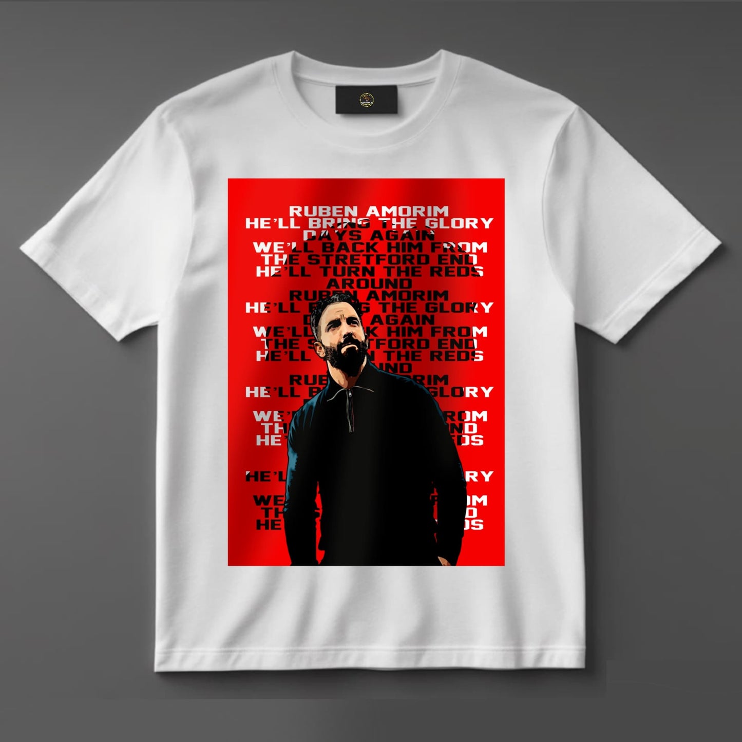Black or white T-shirt featuring bold artwork of Ruben Amorim, linked with Manchester United, styled in club colors with confident pose and strategic flair — a tribute to the potential future manager and tactical mastermind.