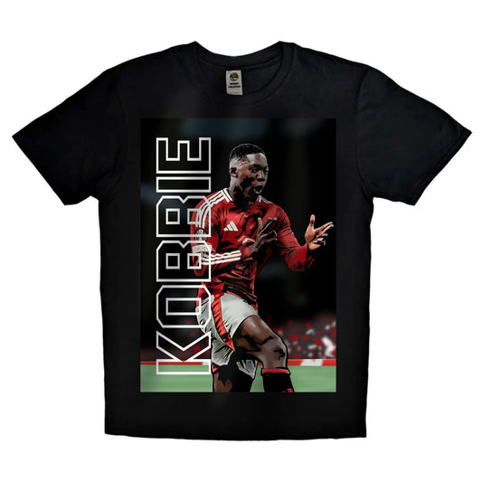 Black or white T-shirt featuring bold artwork of Kobbie Mainoo in Manchester United kit, celebrating as a Europa League hero — a powerful tribute to the young midfield star and his rising legacy.