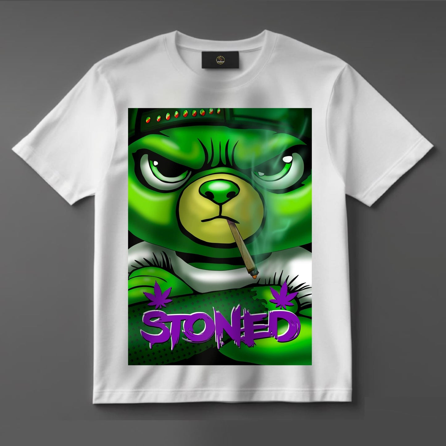 Black or white T-shirt featuring a stoned cartoon-style bear with red eyes, casually smoking a spliff, surrounded by smoke and weed leaves — a chill, eye-catching design for cannabis lovers and stoner fashion.